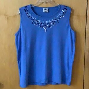 Women’s sleeveless blue blouse. size medium